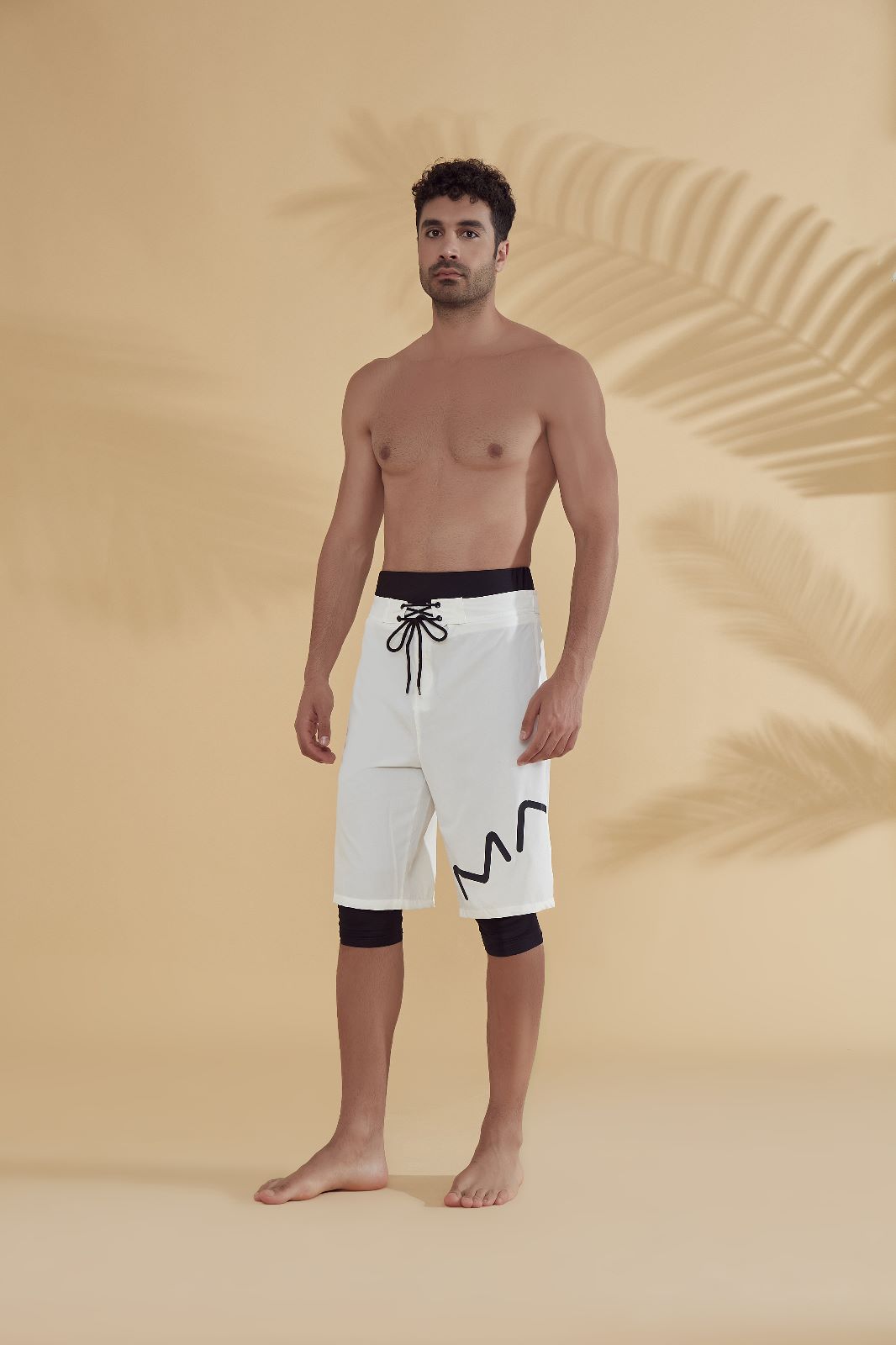 muslim swim shorts worn by a model